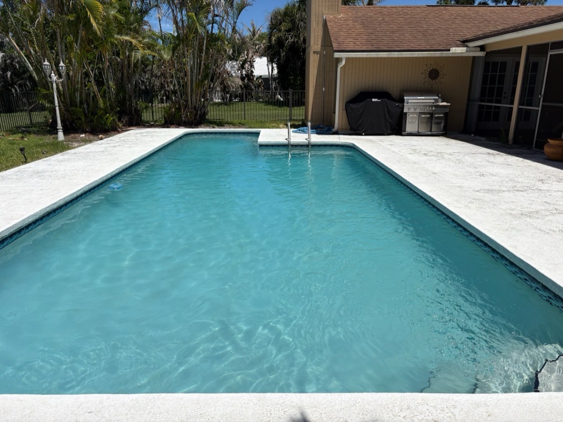 Same rectangular backyard pool clear and blue after Excel Pool Care treatment